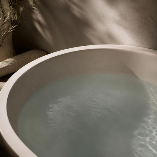 Soothing warm bath tub water representing gentle water therapy for TSW and Moisturiser Withdrawal